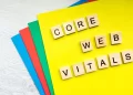 Core Web Vitals displayed with wooden letter tiles on colorful paper background